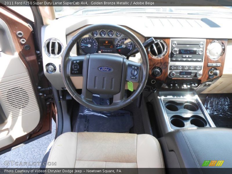 Golden Bronze Metallic / Adobe Beige 2011 Ford F250 Super Duty Lariat SuperCab 4x4