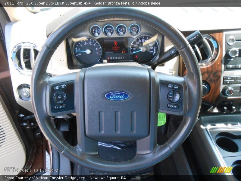 Golden Bronze Metallic / Adobe Beige 2011 Ford F250 Super Duty Lariat SuperCab 4x4