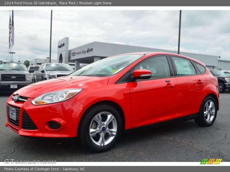 Race Red / Medium Light Stone 2014 Ford Focus SE Hatchback