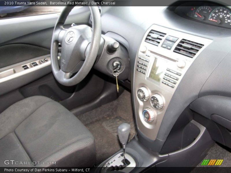 Barcelona Red Metallic / Dark Charcoal 2010 Toyota Yaris Sedan