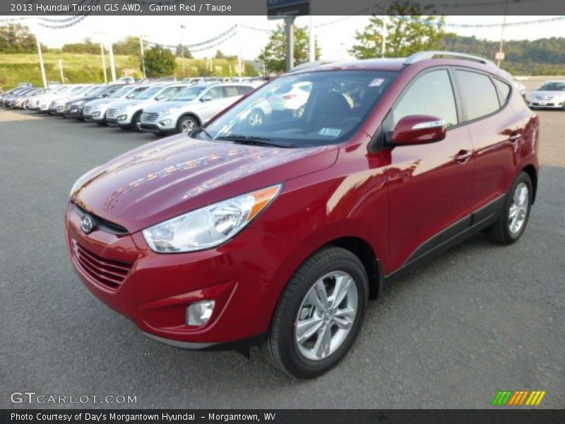 Garnet Red / Taupe 2013 Hyundai Tucson GLS AWD