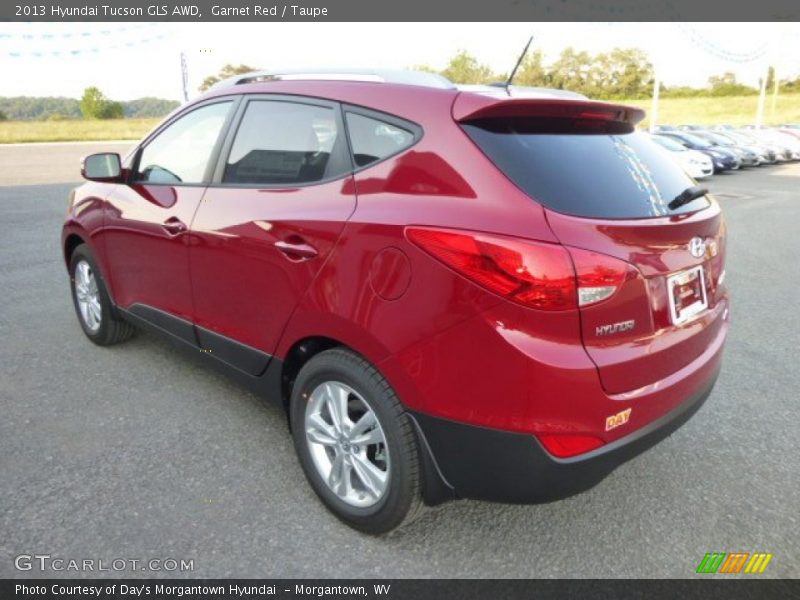 Garnet Red / Taupe 2013 Hyundai Tucson GLS AWD