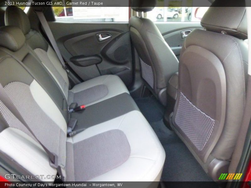 Garnet Red / Taupe 2013 Hyundai Tucson GLS AWD