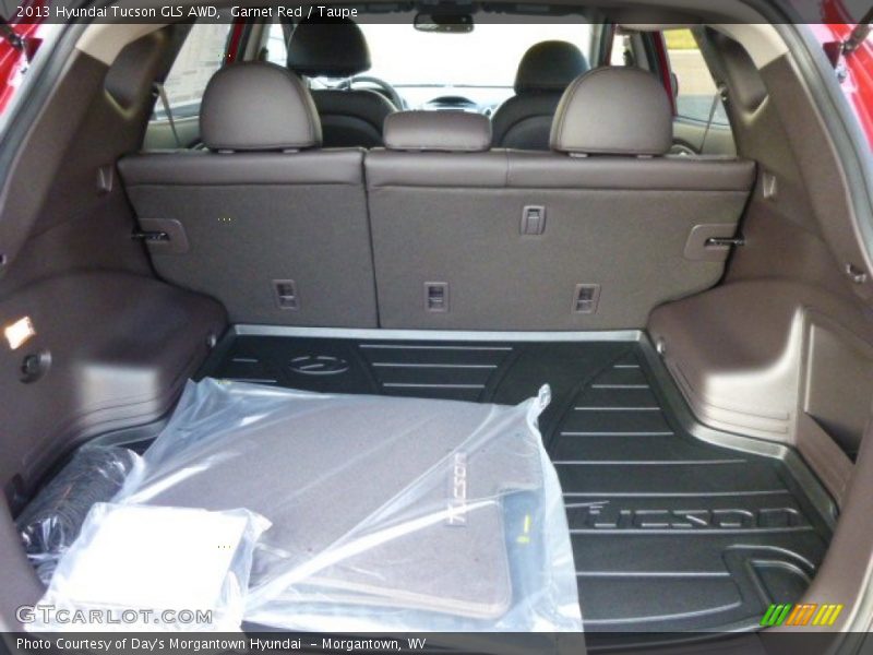 Garnet Red / Taupe 2013 Hyundai Tucson GLS AWD