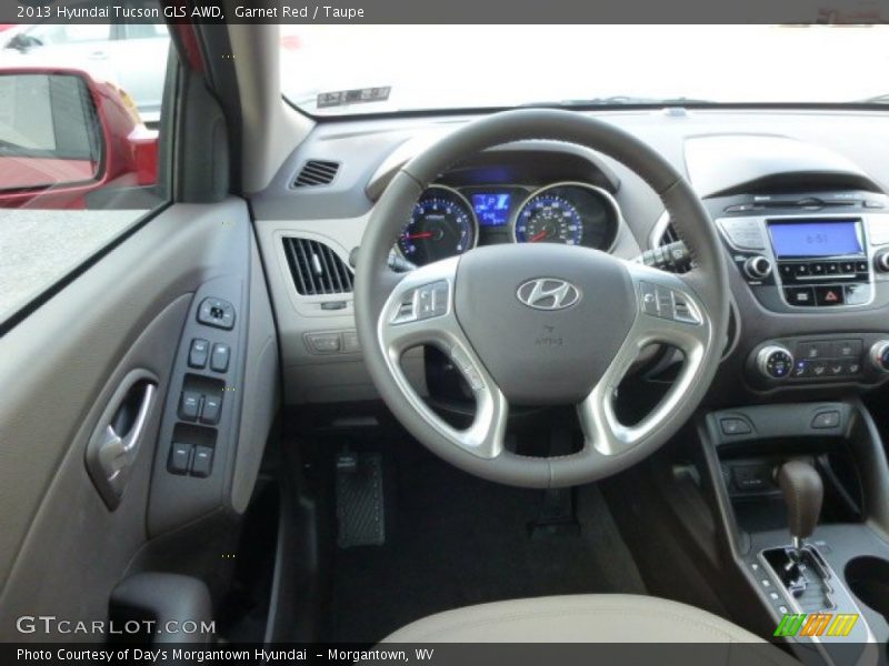 Garnet Red / Taupe 2013 Hyundai Tucson GLS AWD