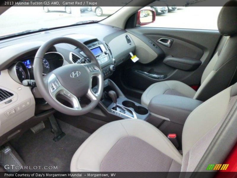 Garnet Red / Taupe 2013 Hyundai Tucson GLS AWD