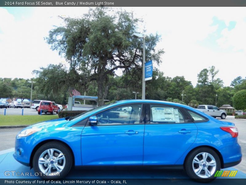 Blue Candy / Medium Light Stone 2014 Ford Focus SE Sedan