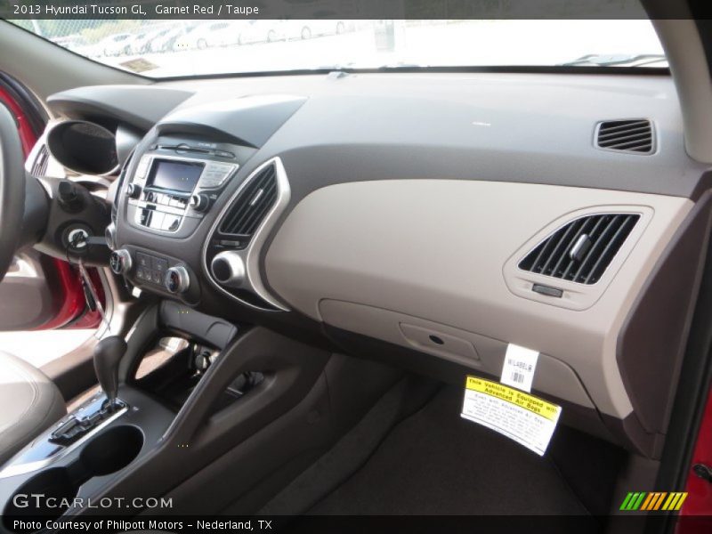 Garnet Red / Taupe 2013 Hyundai Tucson GL