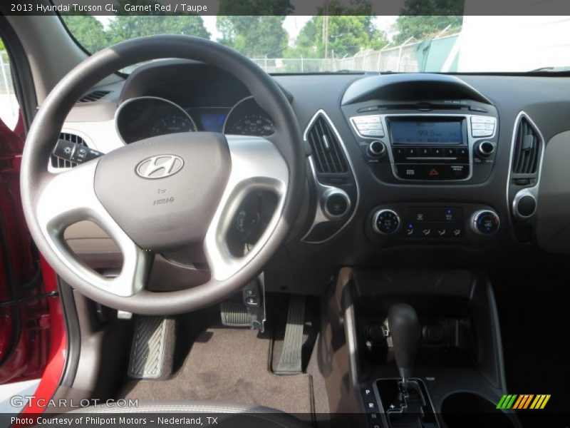Garnet Red / Taupe 2013 Hyundai Tucson GL