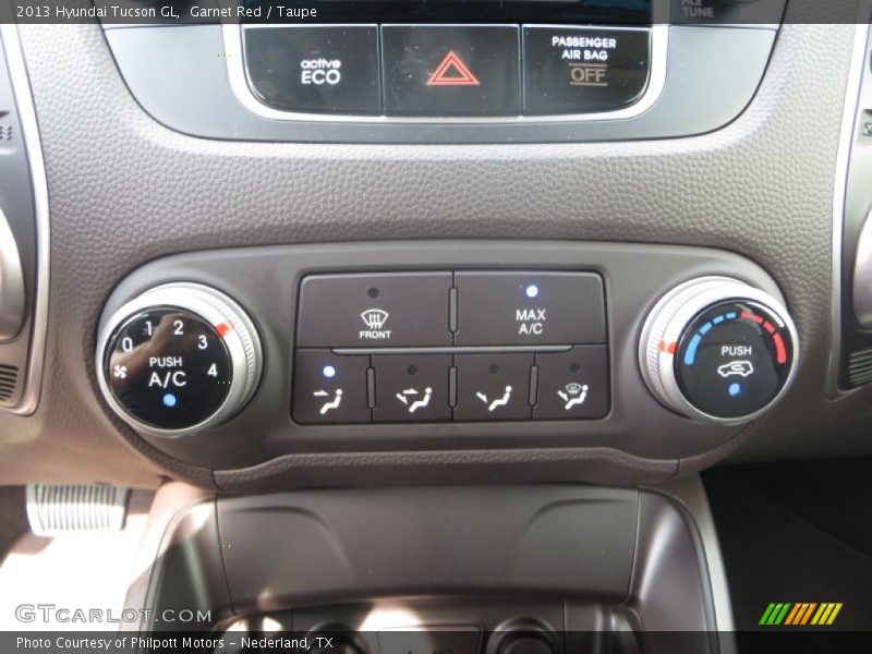Garnet Red / Taupe 2013 Hyundai Tucson GL