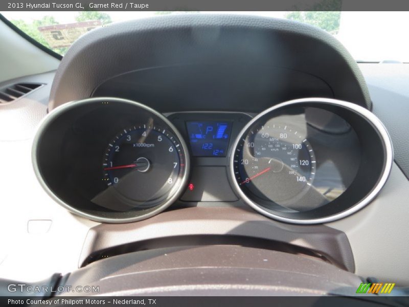 Garnet Red / Taupe 2013 Hyundai Tucson GL
