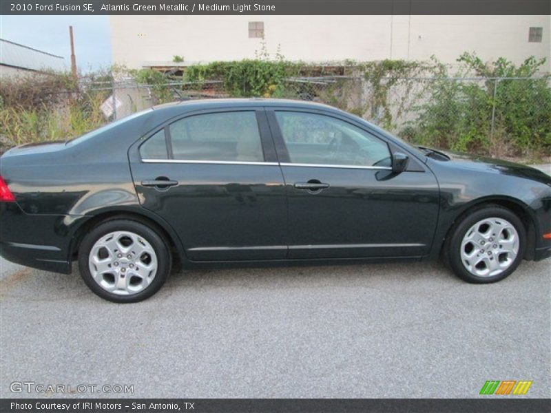 Atlantis Green Metallic / Medium Light Stone 2010 Ford Fusion SE