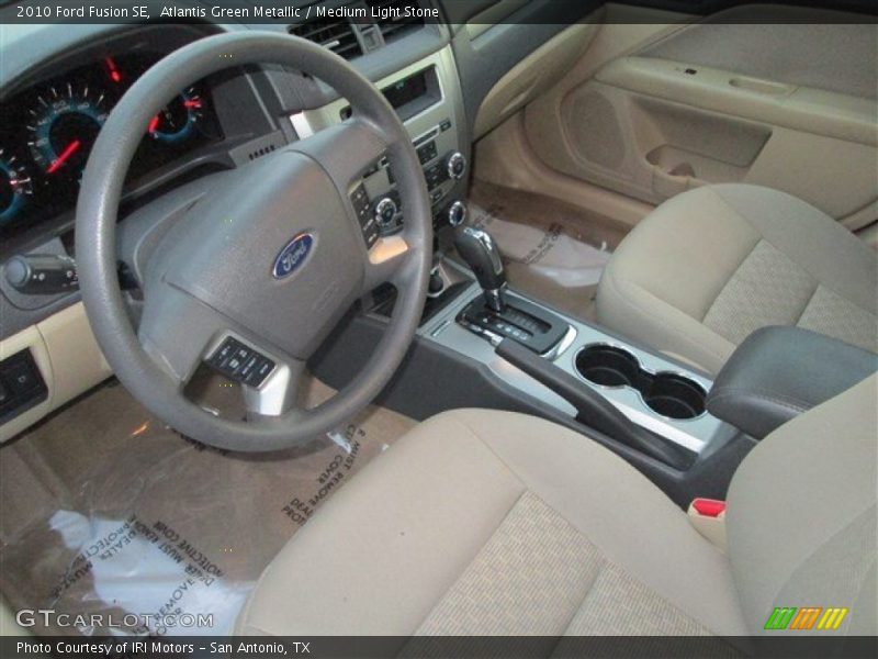 Atlantis Green Metallic / Medium Light Stone 2010 Ford Fusion SE