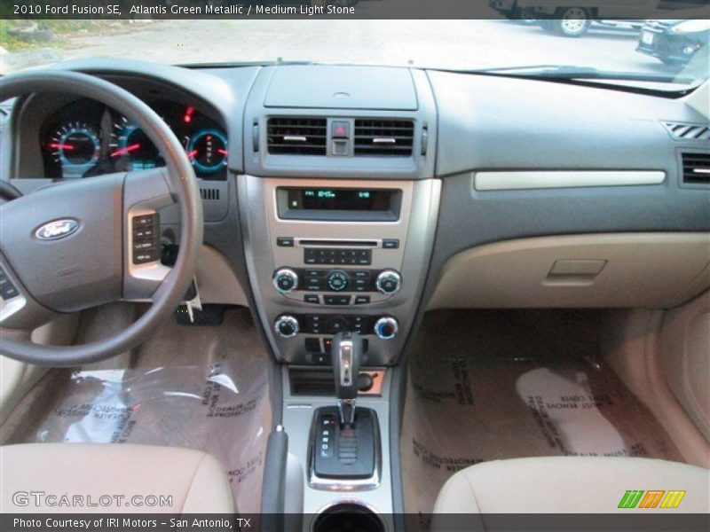 Atlantis Green Metallic / Medium Light Stone 2010 Ford Fusion SE