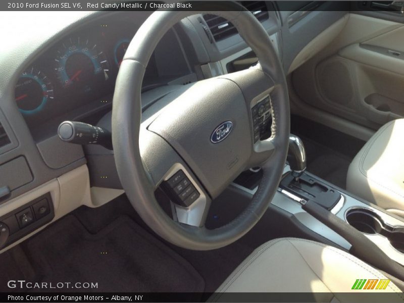 Red Candy Metallic / Charcoal Black 2010 Ford Fusion SEL V6