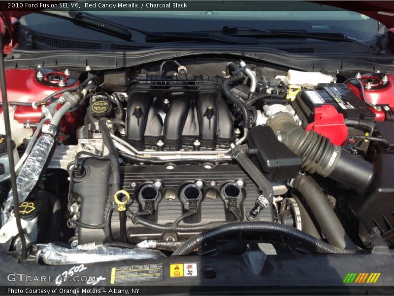 Red Candy Metallic / Charcoal Black 2010 Ford Fusion SEL V6