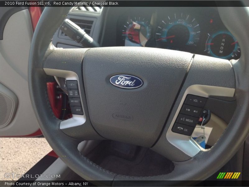 Red Candy Metallic / Charcoal Black 2010 Ford Fusion SEL V6