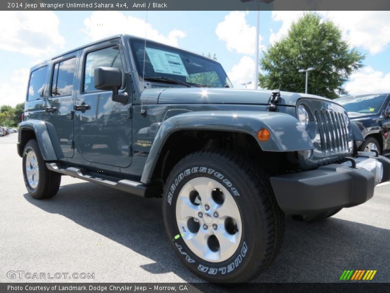 Front 3/4 View of 2014 Wrangler Unlimited Sahara 4x4