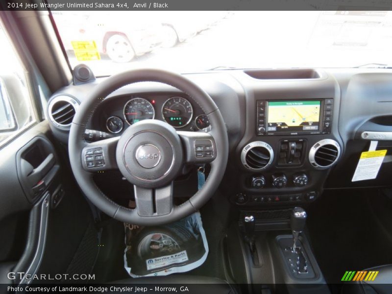 Dashboard of 2014 Wrangler Unlimited Sahara 4x4