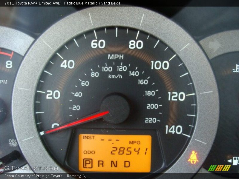 Pacific Blue Metallic / Sand Beige 2011 Toyota RAV4 Limited 4WD