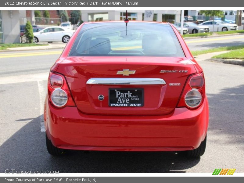 Victory Red / Dark Pewter/Dark Titanium 2012 Chevrolet Sonic LTZ Sedan