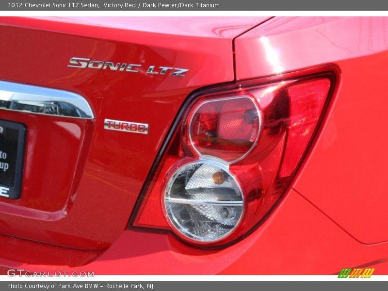 Victory Red / Dark Pewter/Dark Titanium 2012 Chevrolet Sonic LTZ Sedan