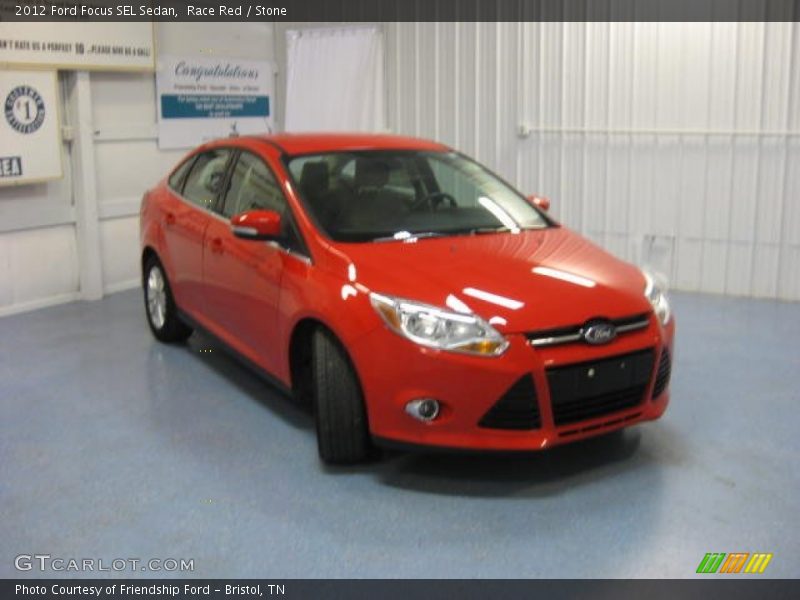 Race Red / Stone 2012 Ford Focus SEL Sedan