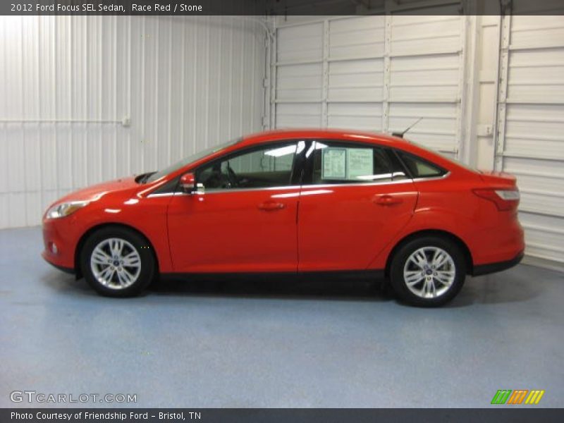Race Red / Stone 2012 Ford Focus SEL Sedan