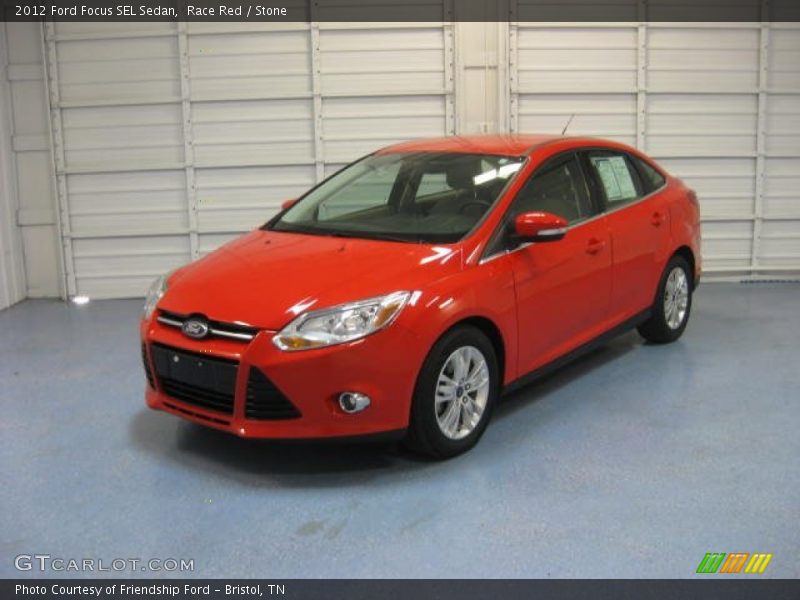Race Red / Stone 2012 Ford Focus SEL Sedan