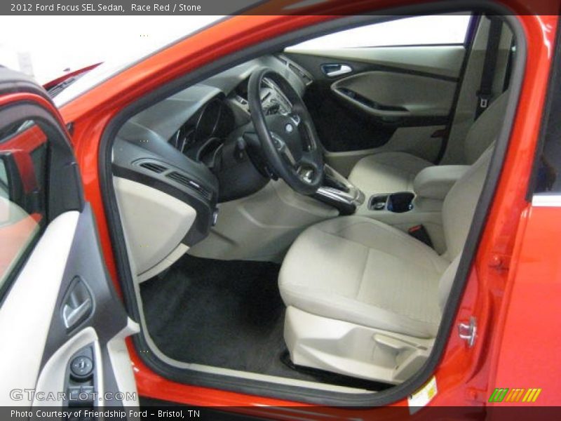 Race Red / Stone 2012 Ford Focus SEL Sedan