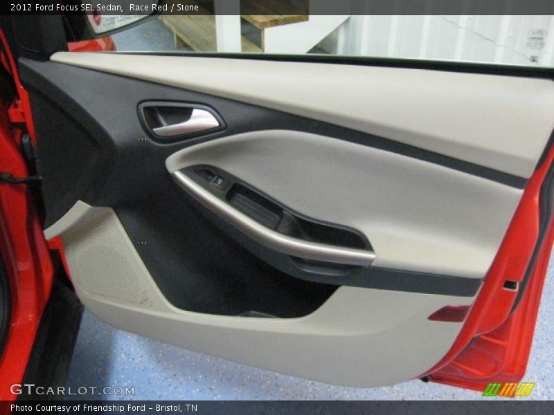 Race Red / Stone 2012 Ford Focus SEL Sedan