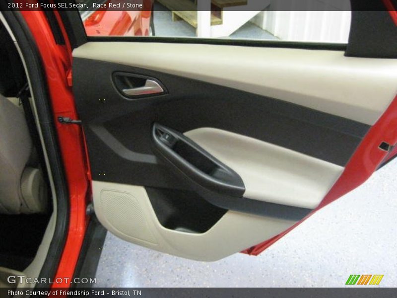 Race Red / Stone 2012 Ford Focus SEL Sedan