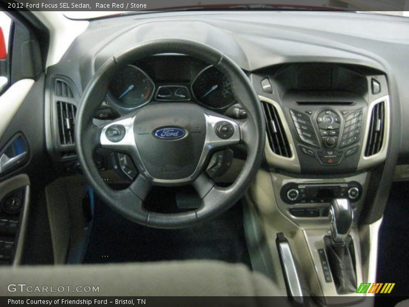 Race Red / Stone 2012 Ford Focus SEL Sedan