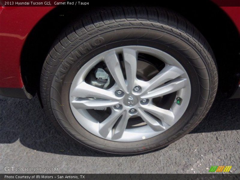 Garnet Red / Taupe 2013 Hyundai Tucson GLS