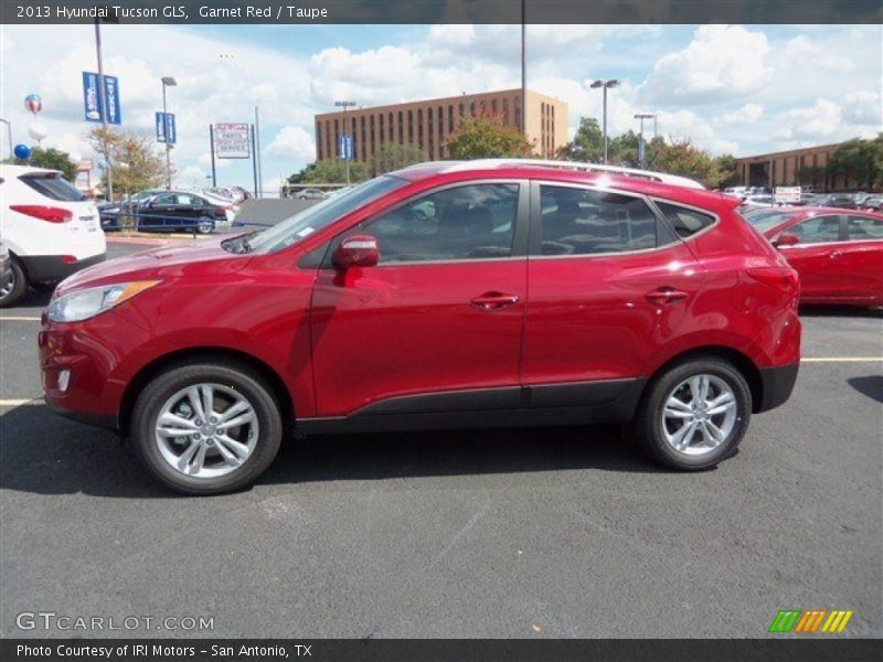 Garnet Red / Taupe 2013 Hyundai Tucson GLS