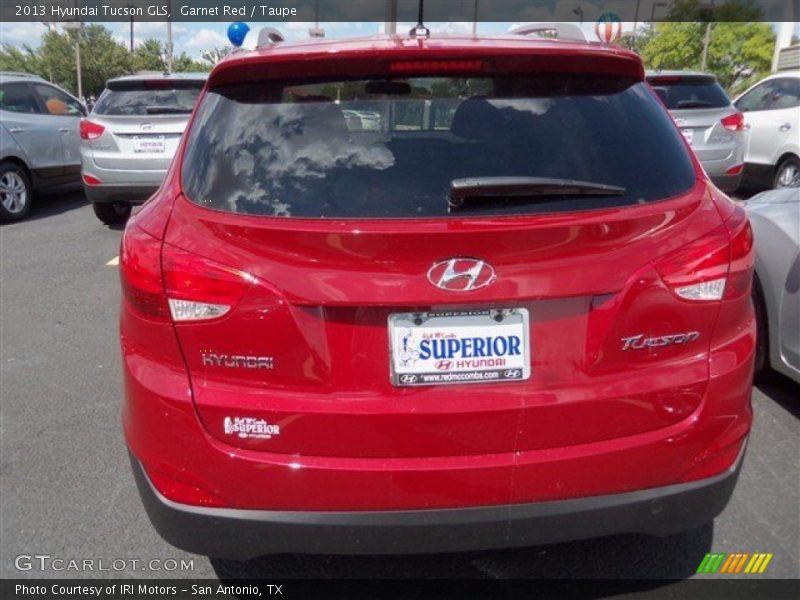 Garnet Red / Taupe 2013 Hyundai Tucson GLS