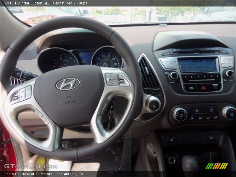 Garnet Red / Taupe 2013 Hyundai Tucson GLS