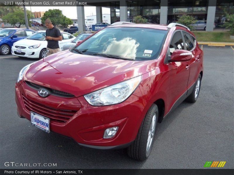 Garnet Red / Taupe 2013 Hyundai Tucson GLS