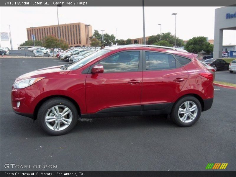 Garnet Red / Taupe 2013 Hyundai Tucson GLS