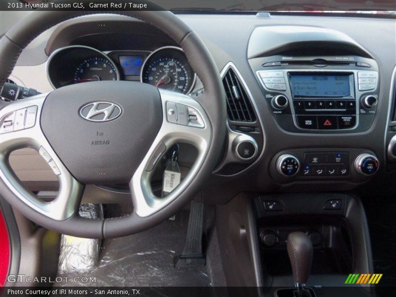 Garnet Red / Taupe 2013 Hyundai Tucson GLS