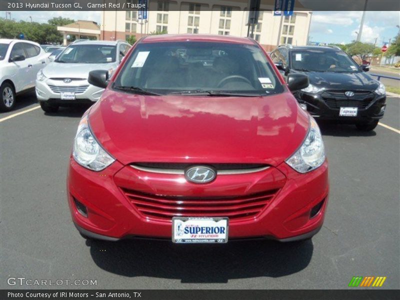 Garnet Red / Taupe 2013 Hyundai Tucson GL