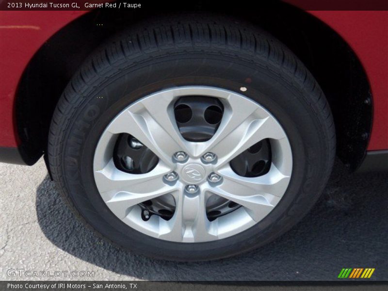 Garnet Red / Taupe 2013 Hyundai Tucson GL