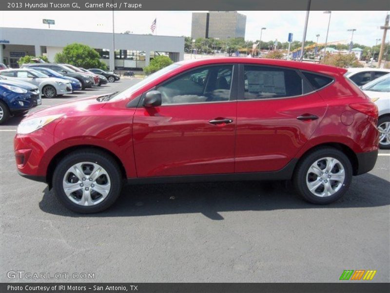 Garnet Red / Taupe 2013 Hyundai Tucson GL