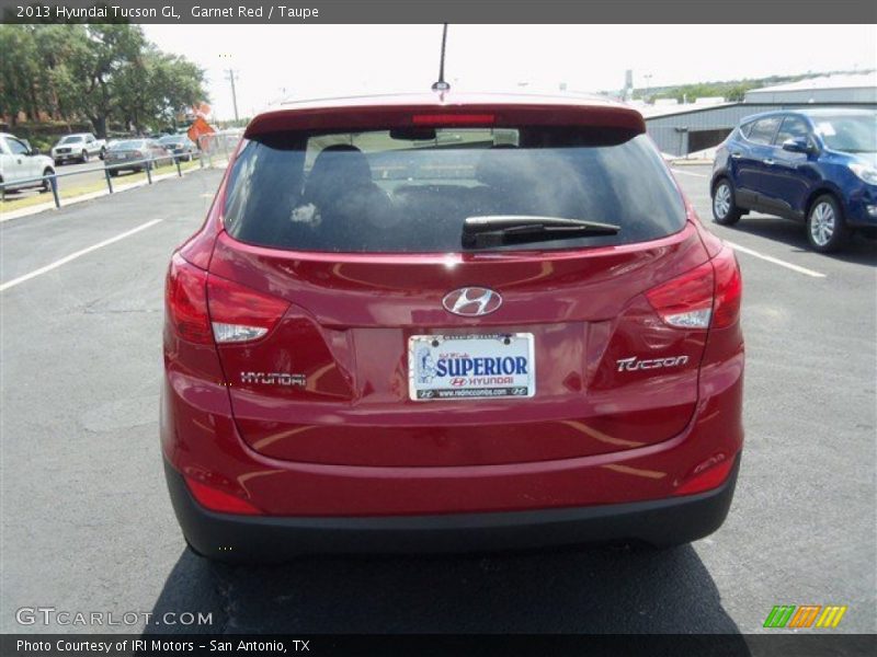 Garnet Red / Taupe 2013 Hyundai Tucson GL