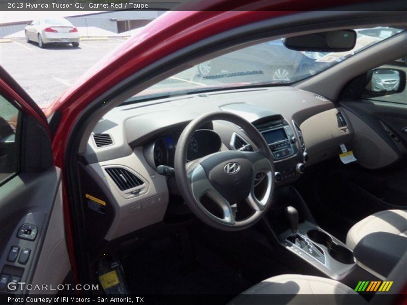 Garnet Red / Taupe 2013 Hyundai Tucson GL