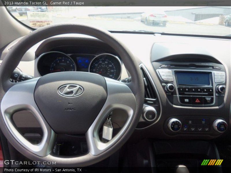 Garnet Red / Taupe 2013 Hyundai Tucson GL