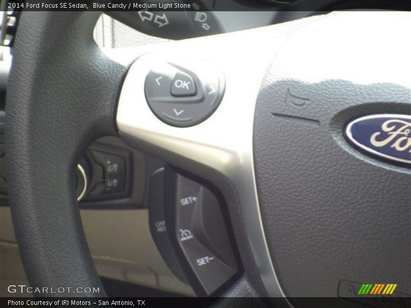 Blue Candy / Medium Light Stone 2014 Ford Focus SE Sedan