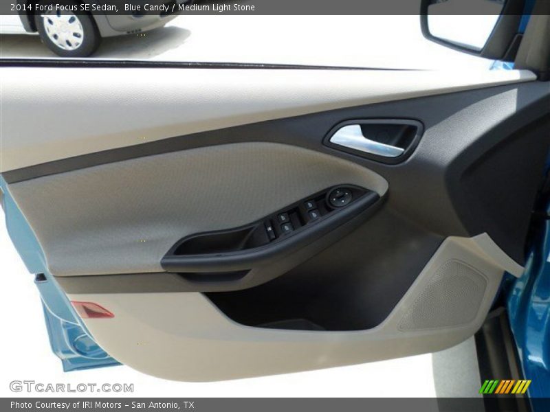 Blue Candy / Medium Light Stone 2014 Ford Focus SE Sedan