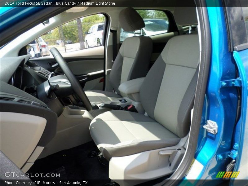Blue Candy / Medium Light Stone 2014 Ford Focus SE Sedan