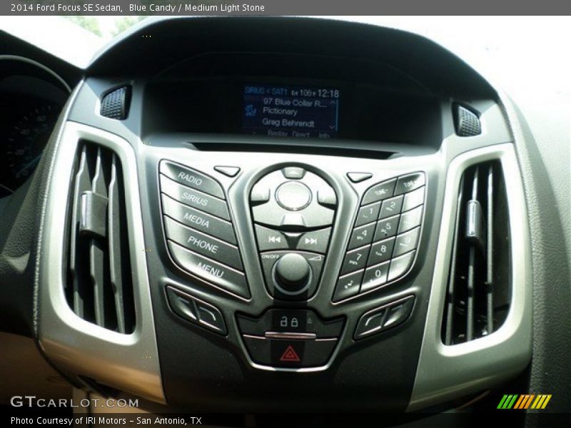 Blue Candy / Medium Light Stone 2014 Ford Focus SE Sedan
